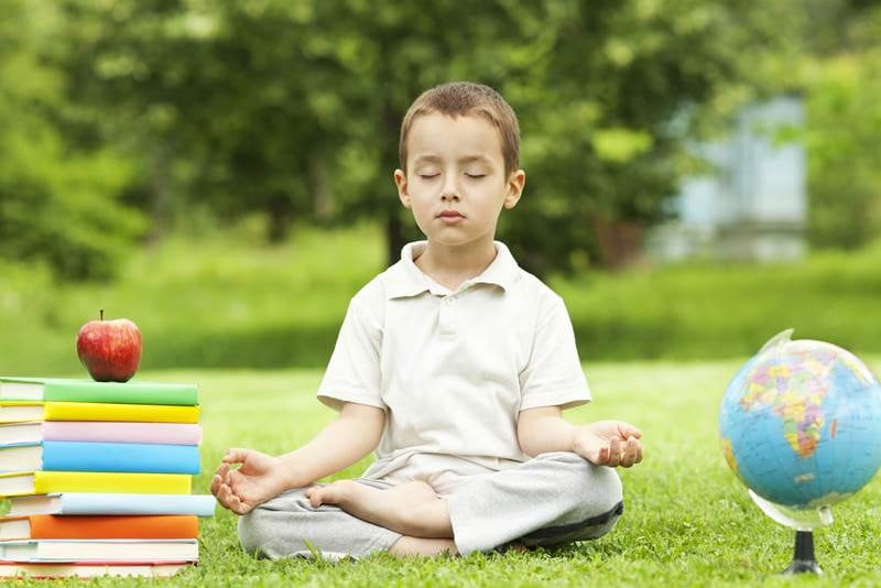 student meditating